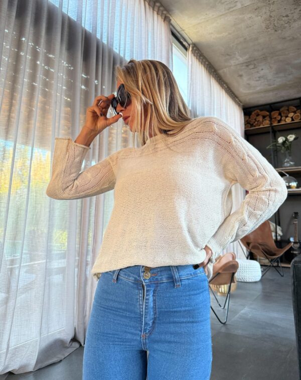 Sweater ochos crudos